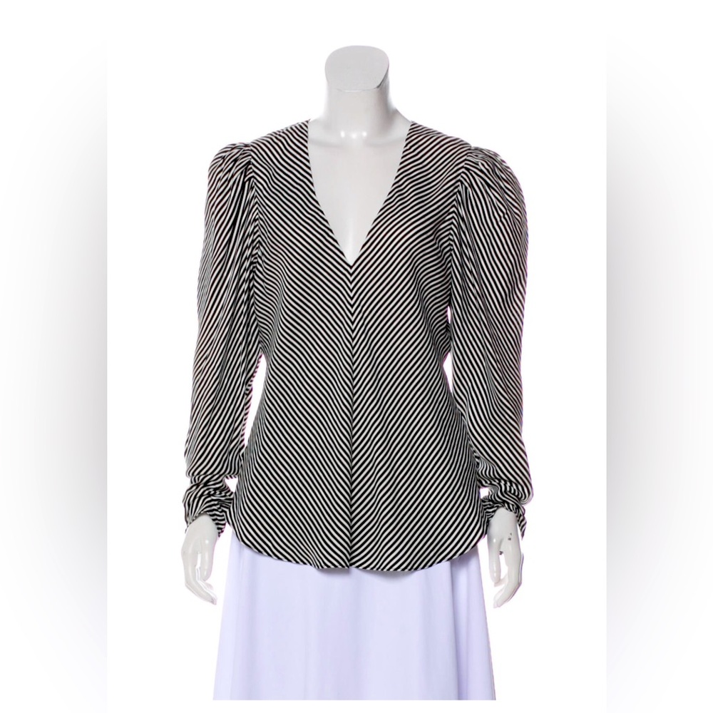 Silk Frame blouse, excellent condition no visible signs of wear.Medium not Large